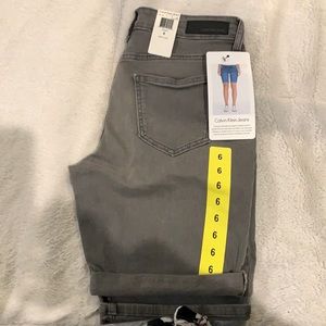 Calvin Klein Denim shorts. BNWT. size 6. Gray wash.